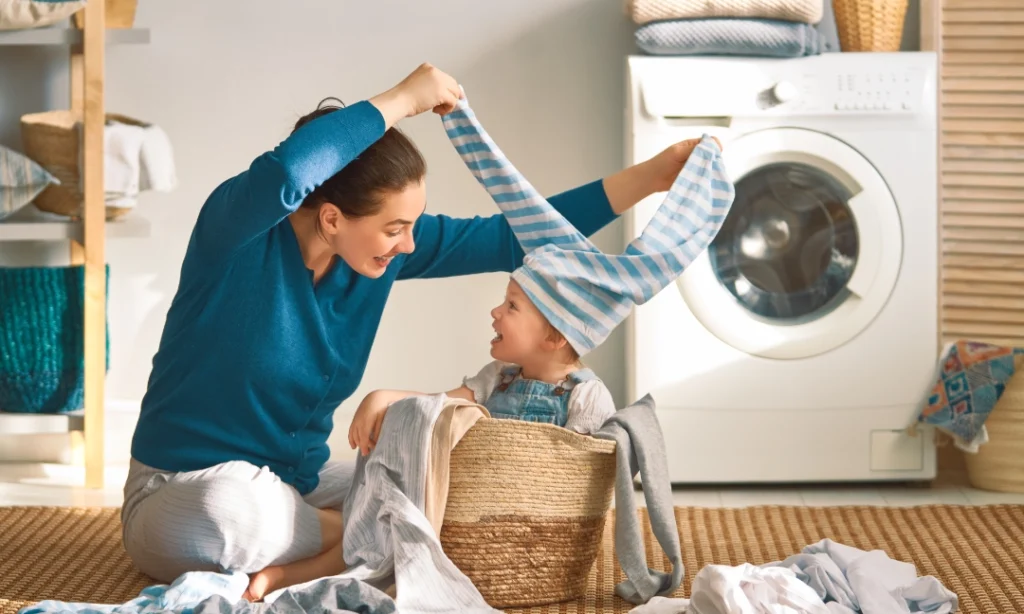 Sorting laundry with a child